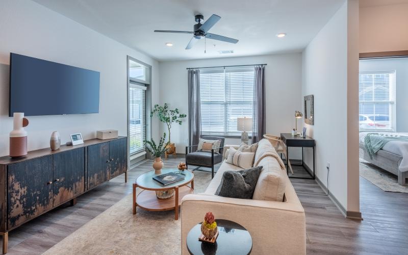 a living room with a couch and a table